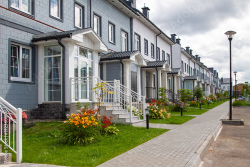 Modern Suburban Living and Real Estate Development with Street level perspective private houses