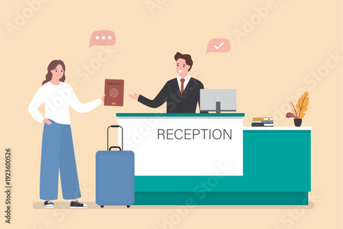 Hotel reception with computer and flower vase on desk. Receptionist talking with female guest tourist in modern lobby. Tourism, hospitality, business concept. Staff at work.
