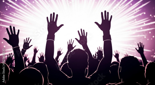 Silhouette of a crowd of people with hands raised in a concert or festival setting with bright purple and white lights