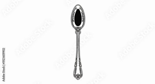 An antique ornate spoon, black oval inset, intricate detailed handle
