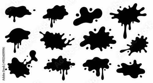 Black ink splashes, blobs and drips isolated on white background