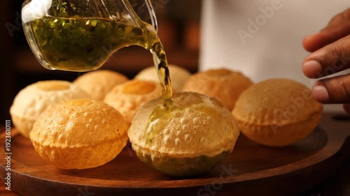 Delicious Indian Pani Puri on wooden plate