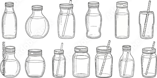 Assortment of glass bottles and jars containing beverages and straws