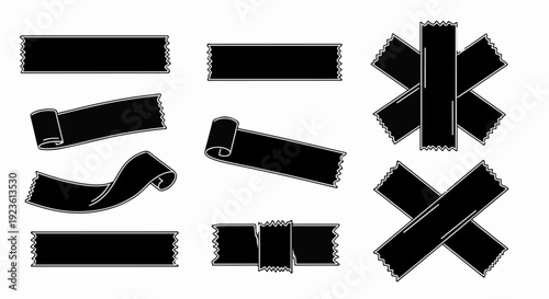 Assortment of black ribbons and tape elements on a white background