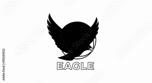Black silhouette of a powerful eagle with outstretched wings within a circular frame