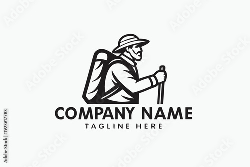 Mountain man logo showing a monochrome figure with hat and mountain background holding staff