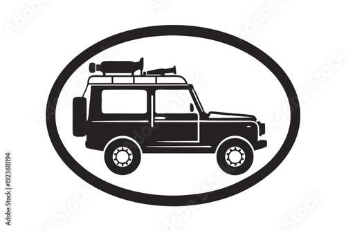 Off road vehicle travels through rugged terrain in a striking black monochrome pattern