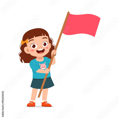 Cute Asian little girl happily holding a plain red flag with a big cheerful smile