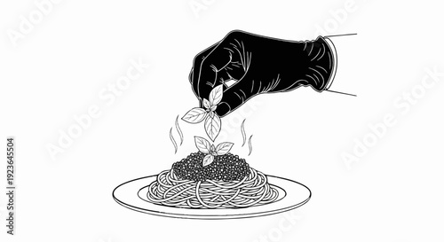 Hand garnishing steaming pasta with fresh basil leaves