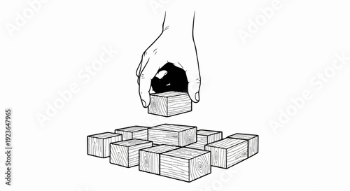Hand placing wooden block onto a scattered foundation of blocks