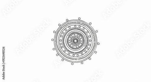 Intricate black and white circular pattern with concentric rings and outer embellishments