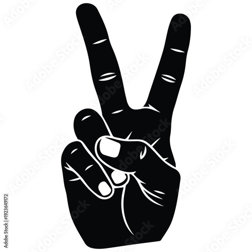 Hand making peace sign gesture in black silhouette
