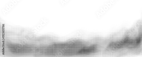Abstract halftone faded gradient texture. Dotted smoke clouds retro style. White and black noise background.