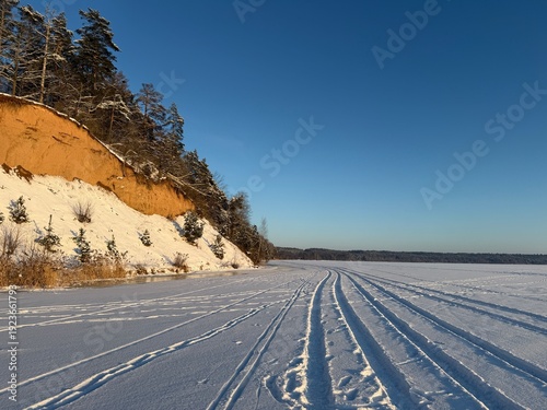 Deep Lake frozen on a sunny day, Kaunas, Lithuania