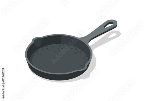 A dark gray kitchen frying pan with a handle and shadow on a neutral background from a high viewpoint