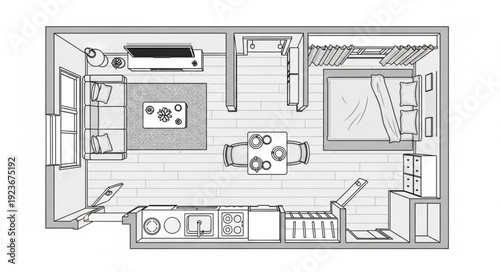 Detailed floor plan of a modern studio apartment with furniture arrangement.
