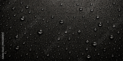 Macro texture of clean blue raindrops and transparent condensation droplets on a wet glass window surface over an abstract black liquid background