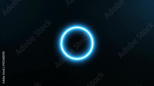 Blue glowing concentric circles pulsate and expand in a dark background, creating a mesmerizing visual effect with a sense of depth and motion