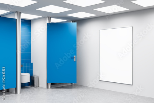 Εκτύπωση καμβά Clean restroom interior with blue stall doors and a large blank poster frame on white wall for mockup or template display in contemporary design setting