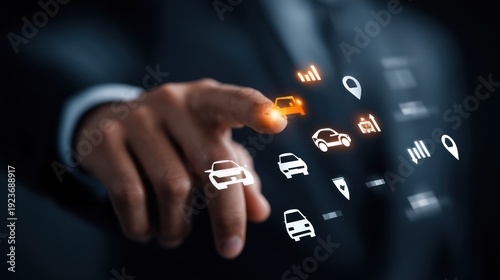 Businessman interacting with digital car icons representing technology and data