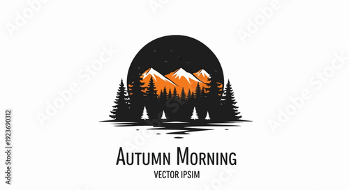 Silhouette of snowy peaks and pine trees against a dark sky at dawn