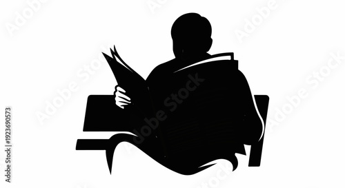 Silhouette of a person reading a book on a bench
