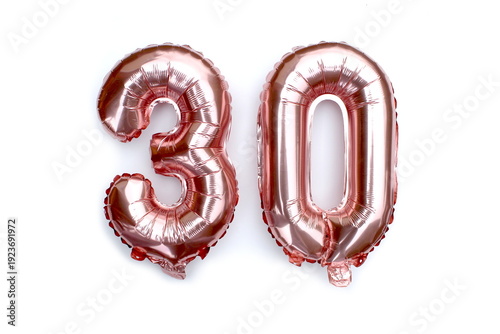 Blown pink number balloons for birthday.