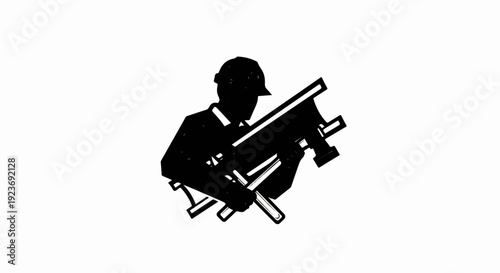 Silhouette of a person wearing a cap, holding a large roll of material