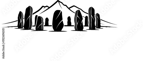 Silhouette of megalithic stones against a mountain range