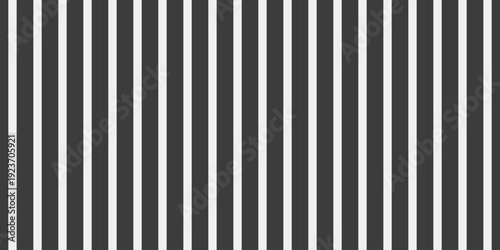 Sleek, minimalist black and white vertical stripes pattern.  Perfect for backgrounds, website design, or textile prints.  Clean, modern aesthetic conveys simplicity, order, and sophistication.