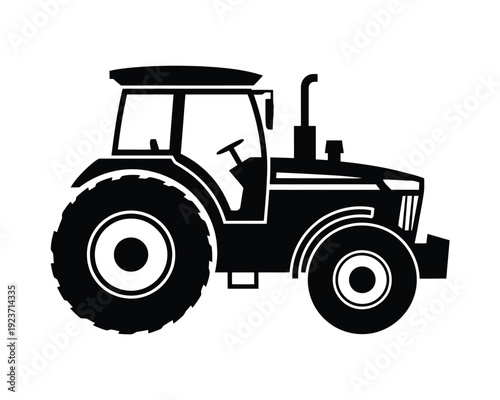 Black and white tractor silhouette with large rear wheel and enclosed cabin agriculture farm machinery