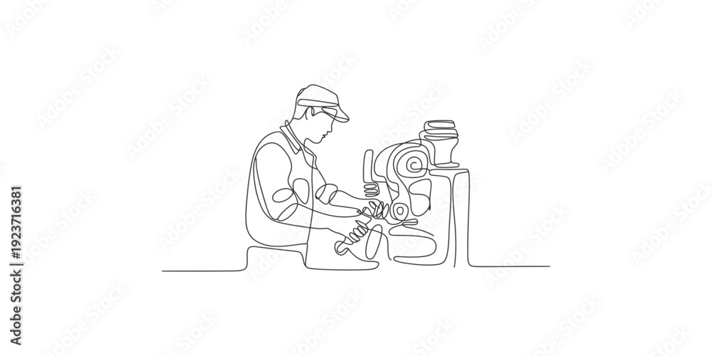 Fototapeta premium One line drawing of a factory worker operating an industrial machine in a workshop