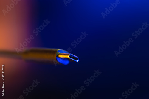 Macro type c connector in neon light. Usb c plug.