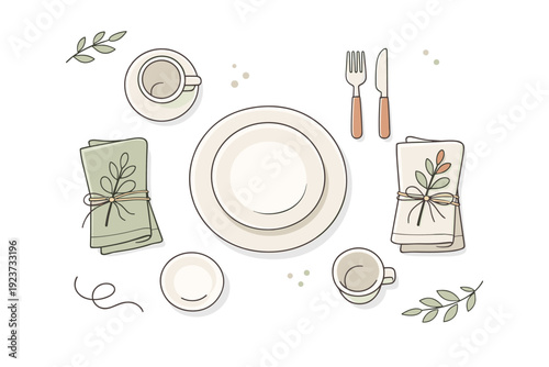 Linen and ceramic place settings. A top-down view of a table setting with folded linen napkins, simple ceramics, and sprigs of greenery tied