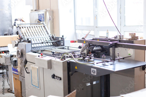 Quadro em tela Folding machine in print shop used to accurately fold printed sheets into brochures, leaflets, signatures and inserts