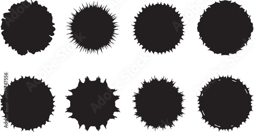 Collection of black ink splatter shapes on white background