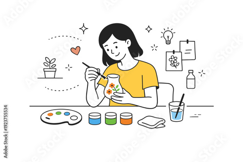 Modern craft and home creativity. A person enjoying painting glassware at a table, relaxed posture and mindful creative hobby atmosphere.