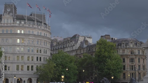 Static long clip of South African High Commission and buildings on Strand with Union Flags flying. Shot on an early autumn evening at twilight