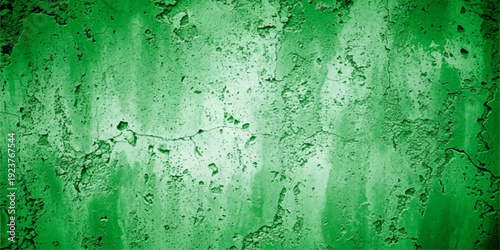Weathered vintage green paint background with a rough grunge texture on an old aged concrete wall surface