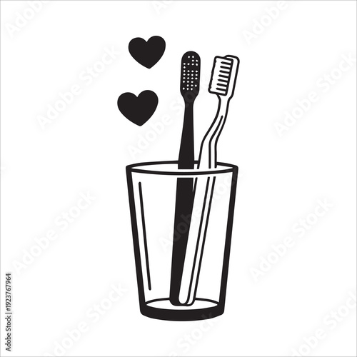 Two toothbrushes in a glass with hearts representing a couple's routine