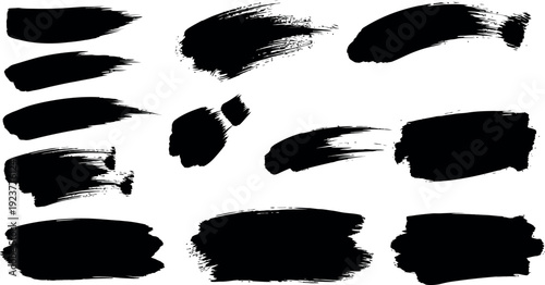 Group of black paint brush marks and strokes on a white background, providing versatile textures and accents for graphic design.