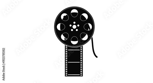 Black film reel with perforated strip a striking silhouette
