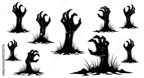 A collection of spooky black silhouette zombie hands emerging from the ground with grass.