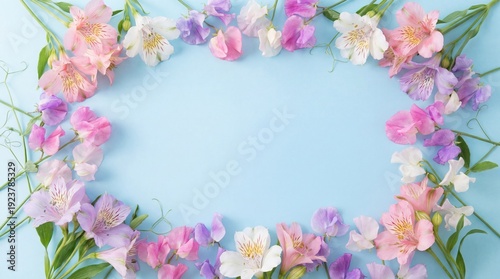 Floral border with sweet peas and alstroemeria on a blue background.