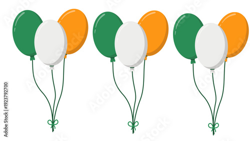 Three sets of balloons in green, white, and orange float gently in the air, captured from a straightforward viewpoint.