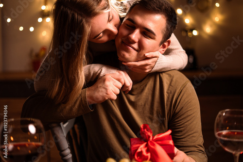 Fotografie young couple in love kissing having romantic dinner and celebrating Valentines d