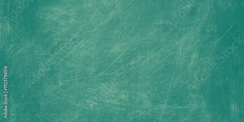Dark green grunge chalkboard texture background; abstract weathered teal cement wall surface for creative graphic design