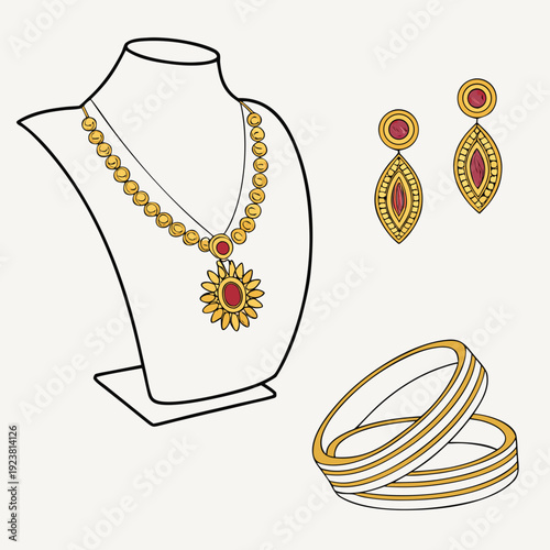 Gold jewelry set with red stones on white background