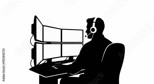 Focused person in silhouette wearing headset and working at multiple computer monitors