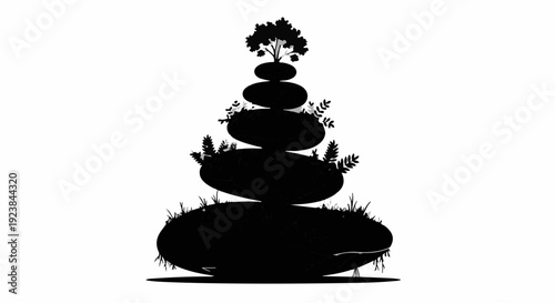 Serene stack of balanced stones with miniature trees and grass, symbolizing harmony and nature's quiet strength.